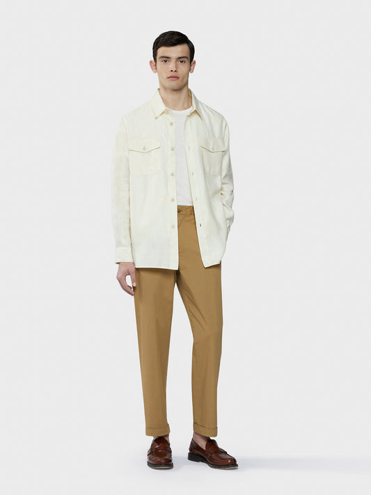Sand-colored trousers in a cotton-elastane blend