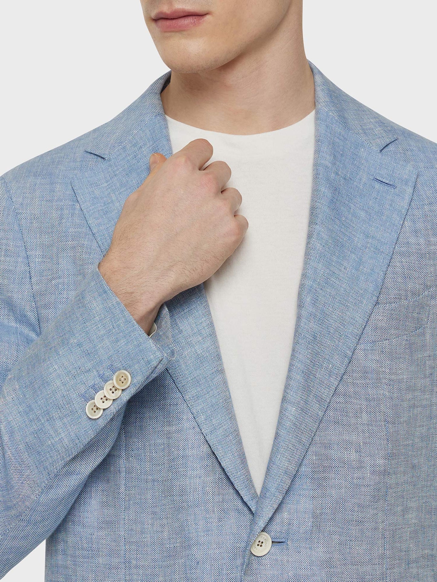 Caruso Menswear Abbigliamento Uomo Giacca aida monopetto in lino azzurra dettaglio