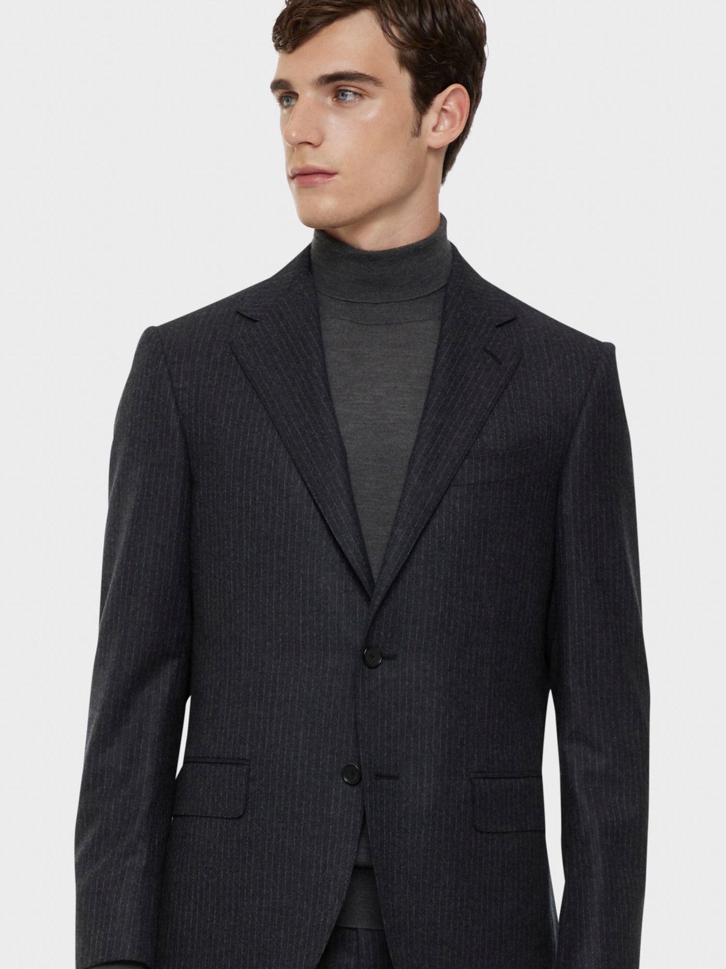 Caruso Menswear Abbigliamento Uomo Abito norma monopetto in flanella di lana grigio drop 7R dettaglio giacca