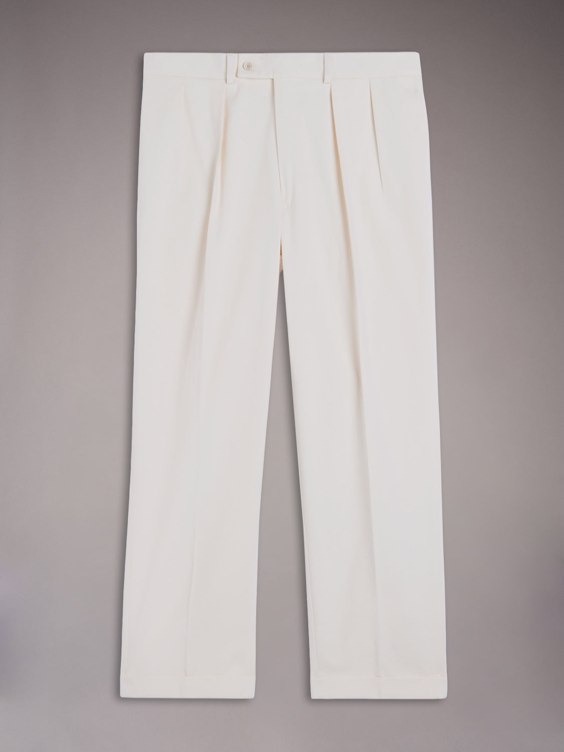 High-waisted trousers in white cotton gabardine