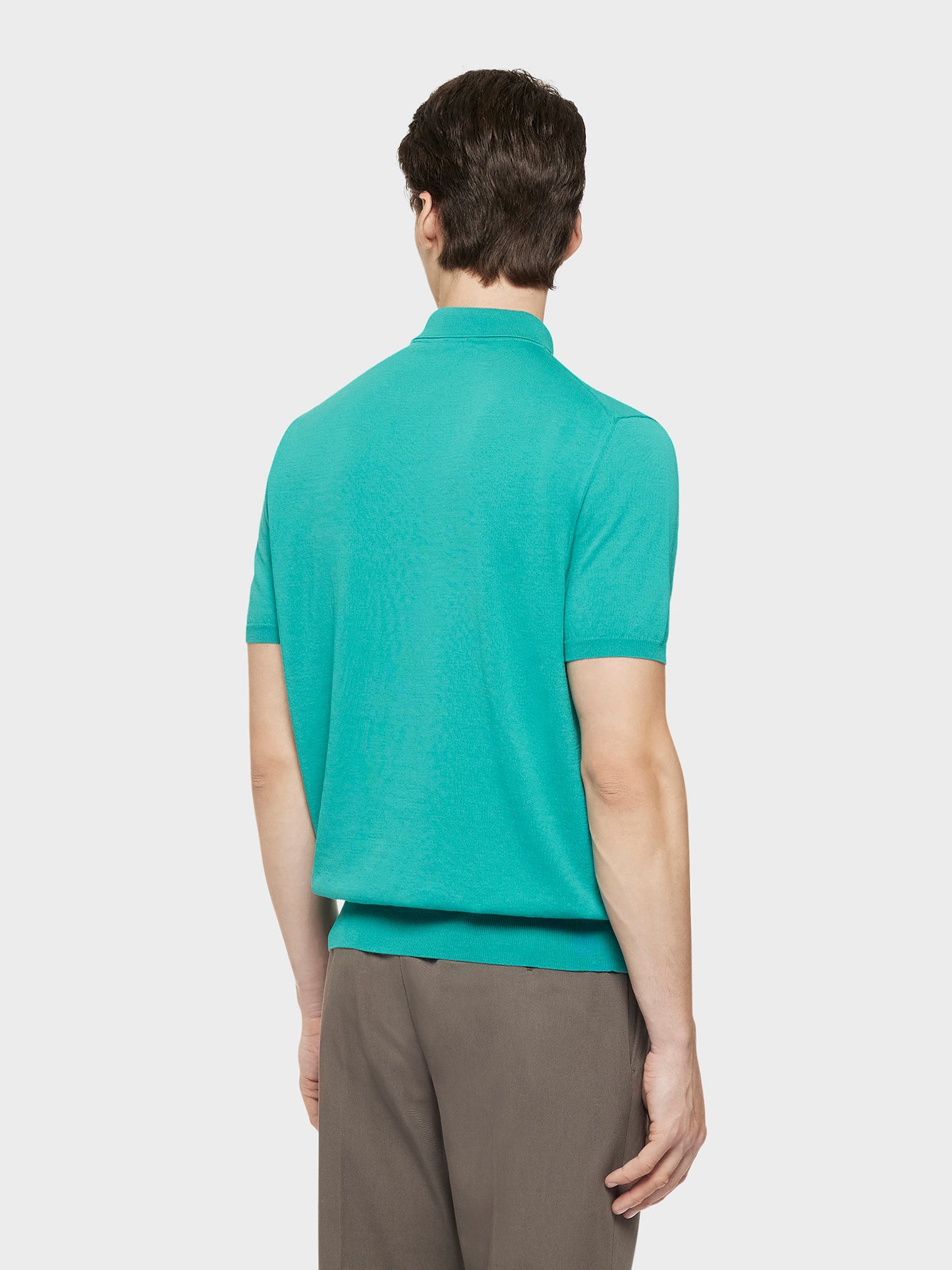 Short-sleeved polo in emerald green cotton