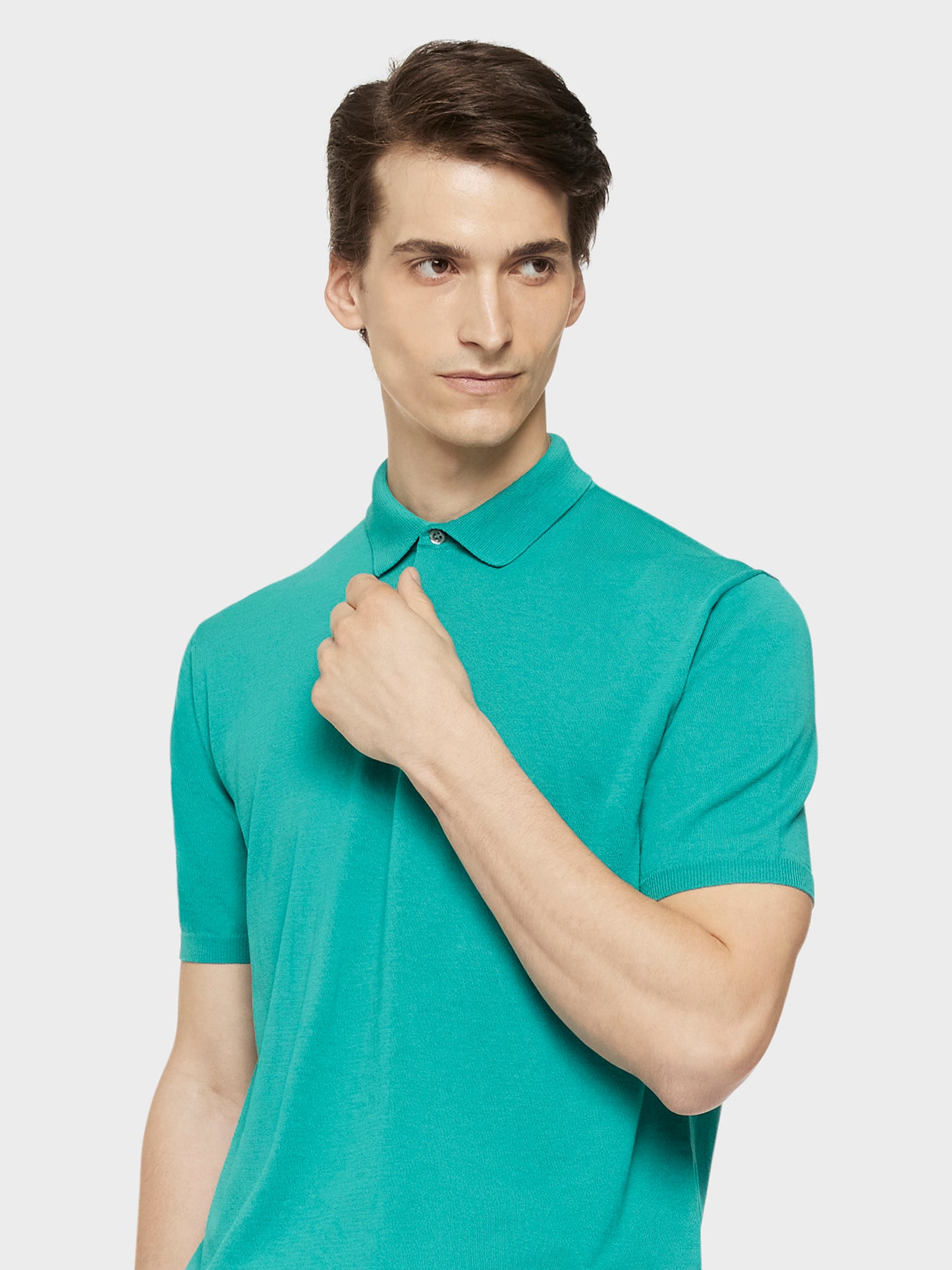 Short-sleeved polo in emerald green cotton